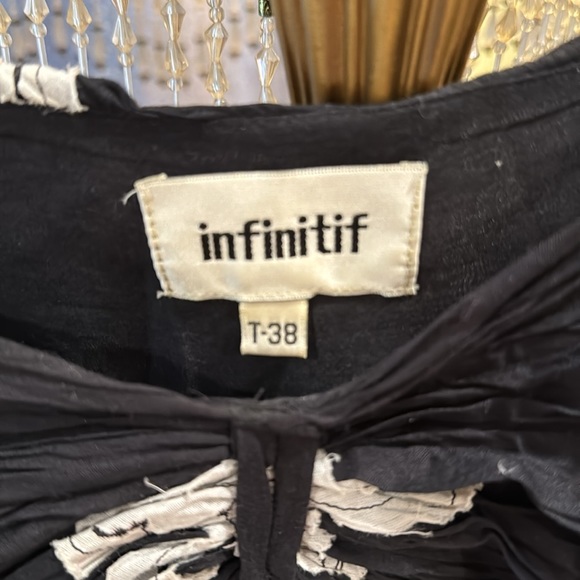 Black and white midi dress. Linen fabric .French brand. Side zipper - Picture 4 of 4